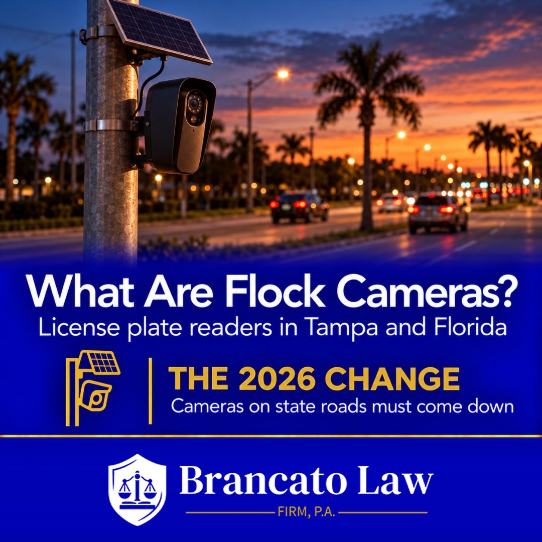 Cover graphic for The Brancato Law Firm, P.A. guide to Flock cameras in Florida by Tampa criminal defense attorney Rocky Brancato. A solar-powered license plate reader camera on a pole beside a Florida road at dusk, with the headline What Are Flock Cameras? and the 2026 change: law enforcement plate-reader cameras on state road rights-of-way must come down under FDOT Memorandum No. 26-01.